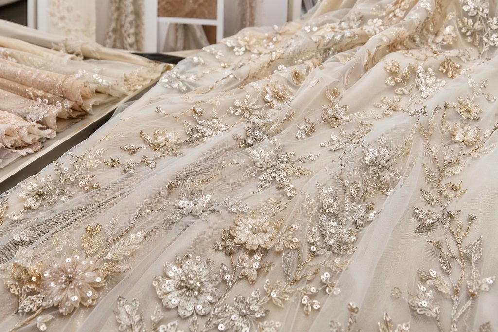 Floral embroidered sequin fabric for eveningwear and bridal wholesale sourcing