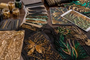 Gold, emerald and black sequin embroidery fabrics for African fashion sourcing