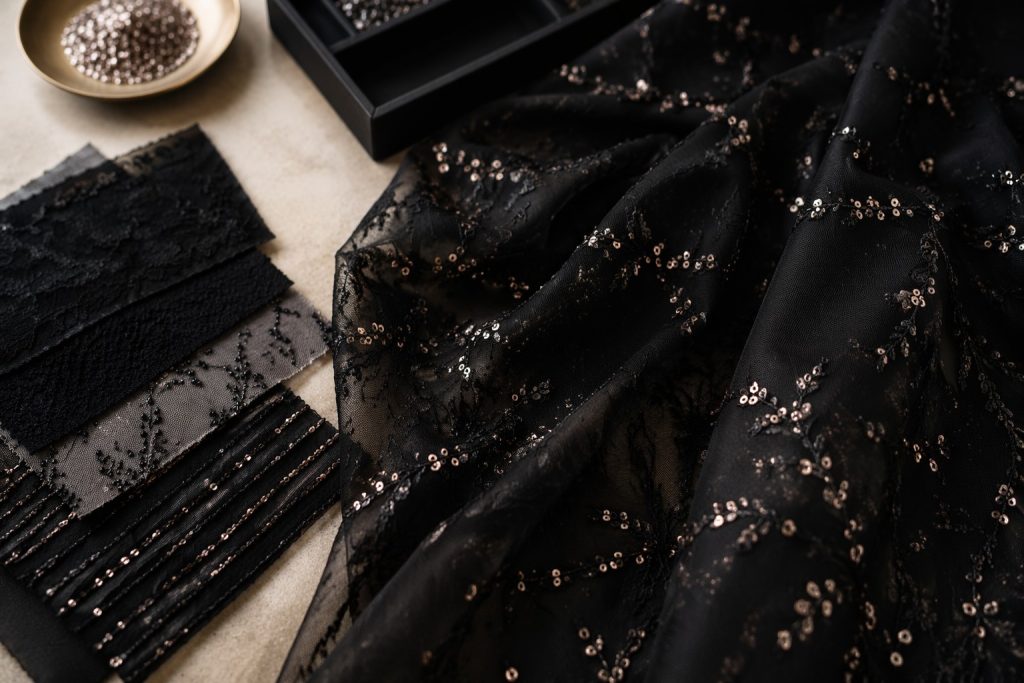 Black embroidery mesh with sequin detail for premium Gulf abaya fabric sourcing