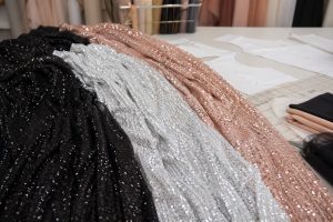 Mini sequin fabric on stretch mesh for dancewear and fashion wholesale sourcing
