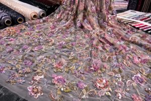 High-density floral embroidery with sequins and beads on stable mesh