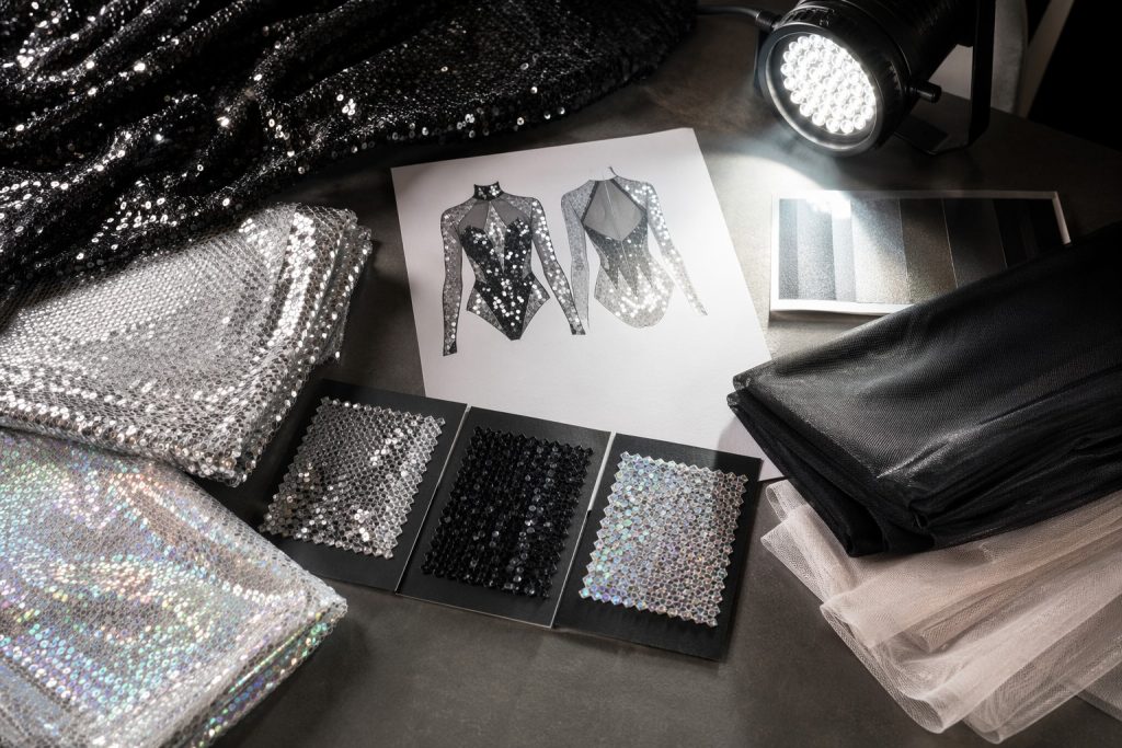 Silver black and iridescent sequin mesh swatches for performance costume sourcing