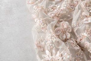 Sustainable 3D sequin and embroidery fabric on mesh for wholesale fashion sourcing