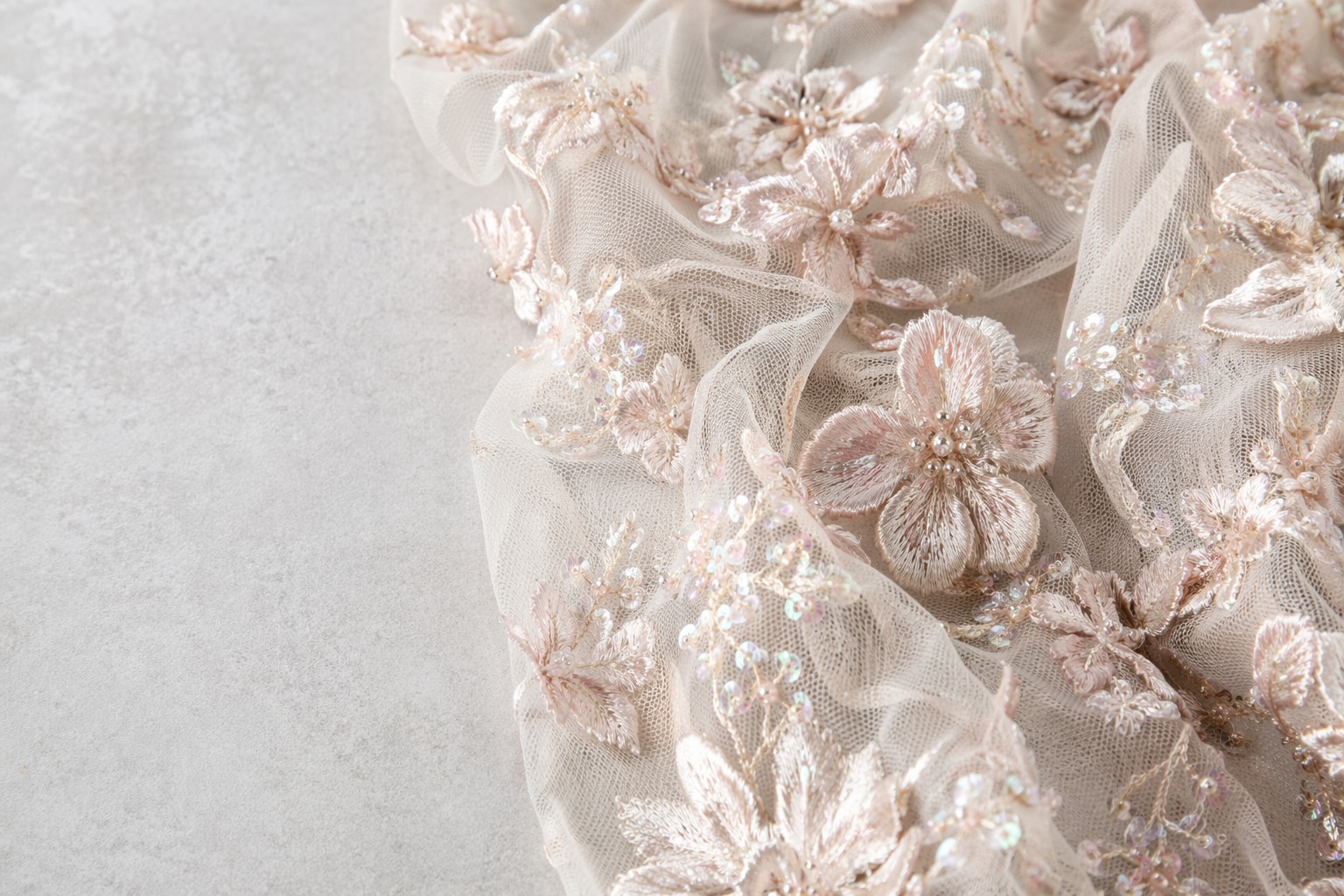 Sustainable 3D sequin and embroidery fabric on mesh for wholesale fashion sourcing