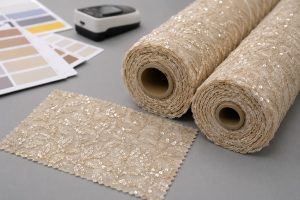 Approved A4 sequin swatch matched against bulk fabric rolls for color consistency