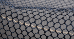 Black 40D diamond mesh backing with dense 3D floral sequin embroidery