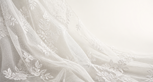 Ivory bridal lace embroidery on fine mesh with delicate floral motifs