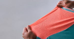 Sports fabric stretched to show breathable mesh structure with an athletic vibe