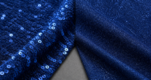 Side-by-side comparison of deep sapphire stitched sequin fabric and smooth glitter powder fabric for evening wear